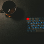 dev achievement keyboard and coffee