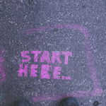 start here in chalk on street for achievement