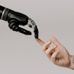 robot hand touching for achievement