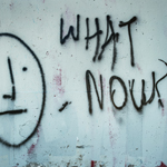 spray paint on wall asking question for achievement